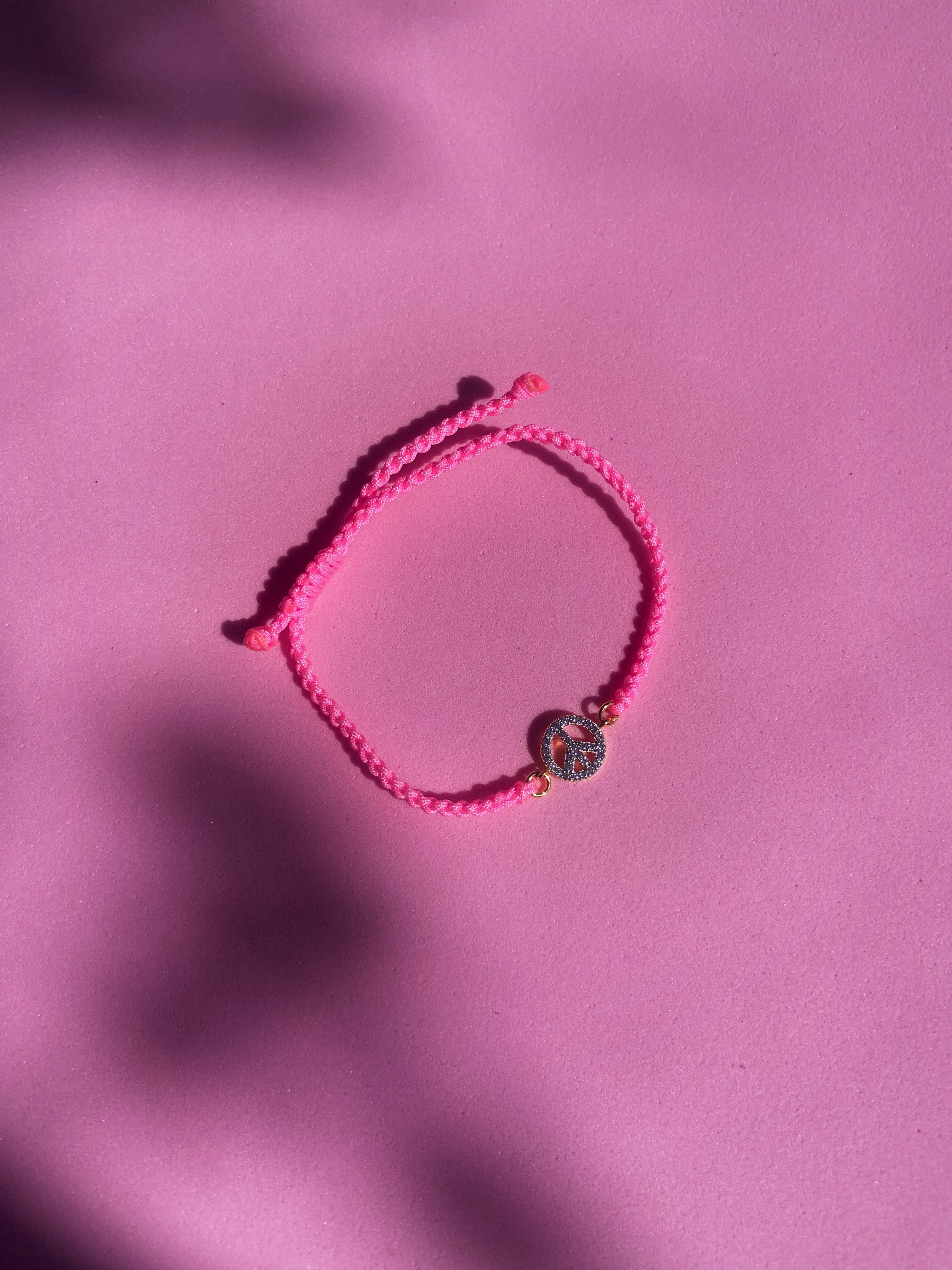 PULSERA PEACE FUCSIA