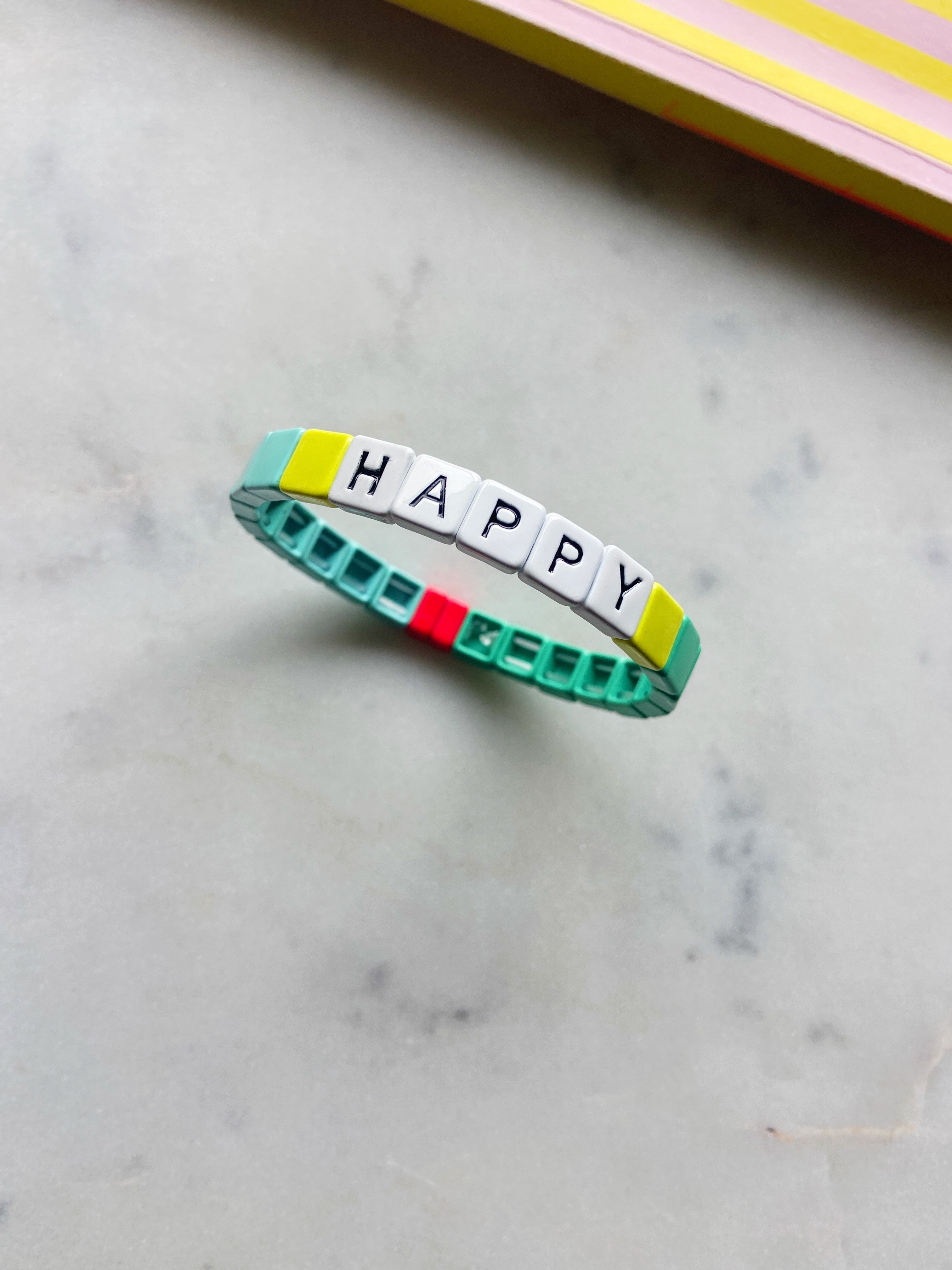 PULSERA HAPPY