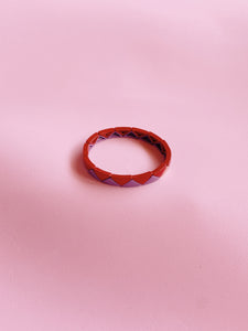 PULSERA TRIÁNGULOS LILA RED
